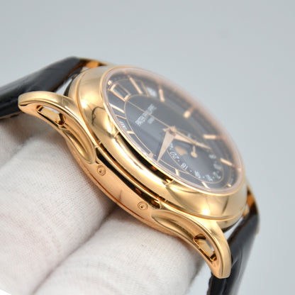 Patek Philippe Annual Calendar 5205R-010 18k Rose Gold Black Dial Box & Papers