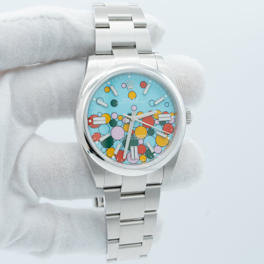 Rolex Oyster Perpetual 41mm 124300 Turquoise Blue "Celebration" Motif Index Dial