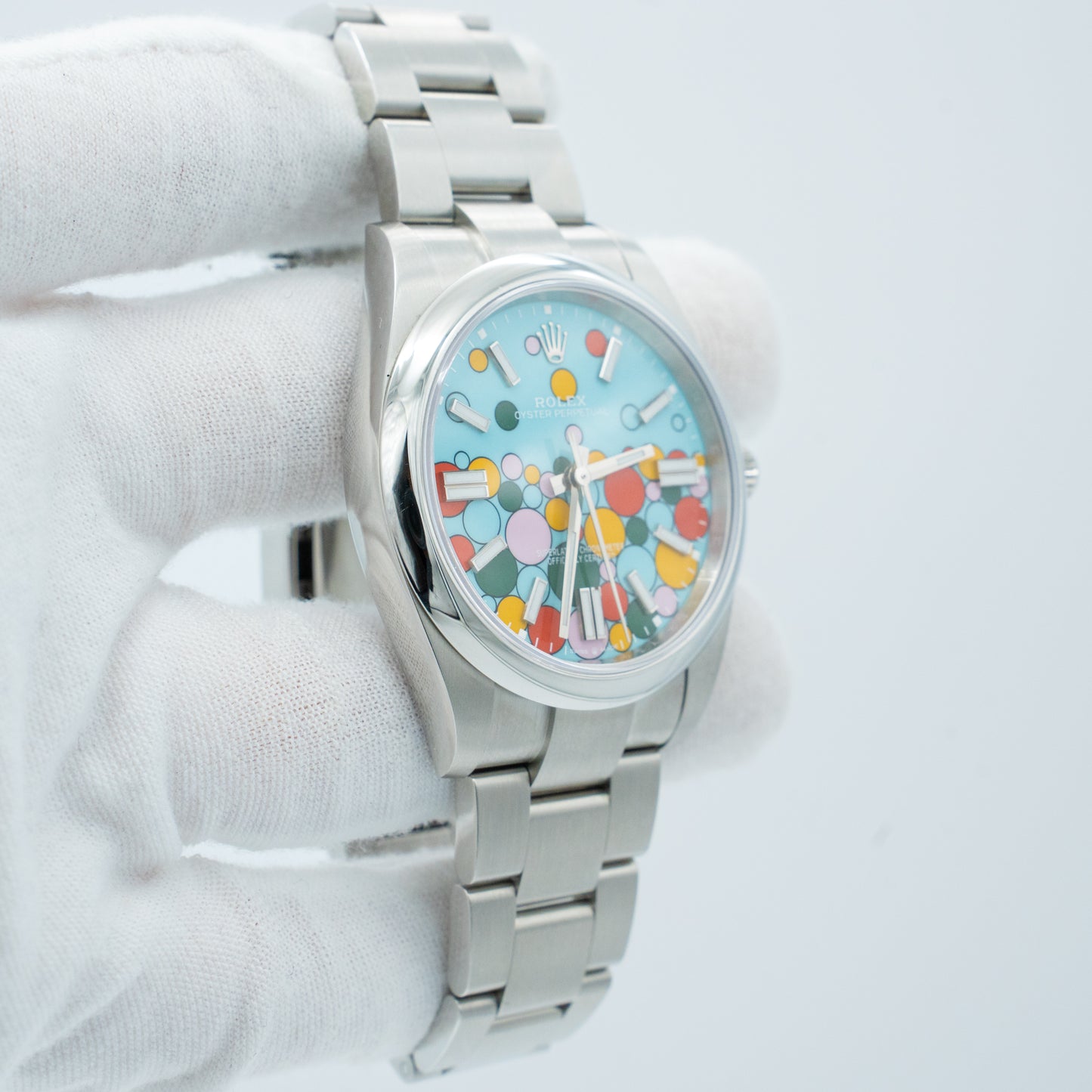 Rolex Oyster Perpetual 41mm 124300 Turquoise Blue "Celebration" Motif Index Dial