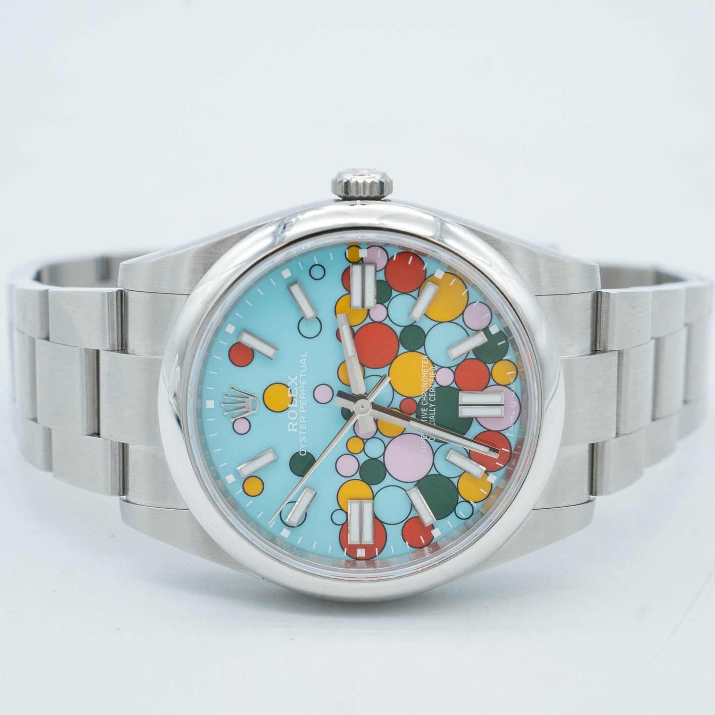 Rolex Oyster Perpetual 41mm 124300 Turquoise Blue "Celebration" Motif Index Dial