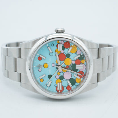 Rolex Oyster Perpetual 41mm 124300 Turquoise Blue "Celebration" Motif Index Dial